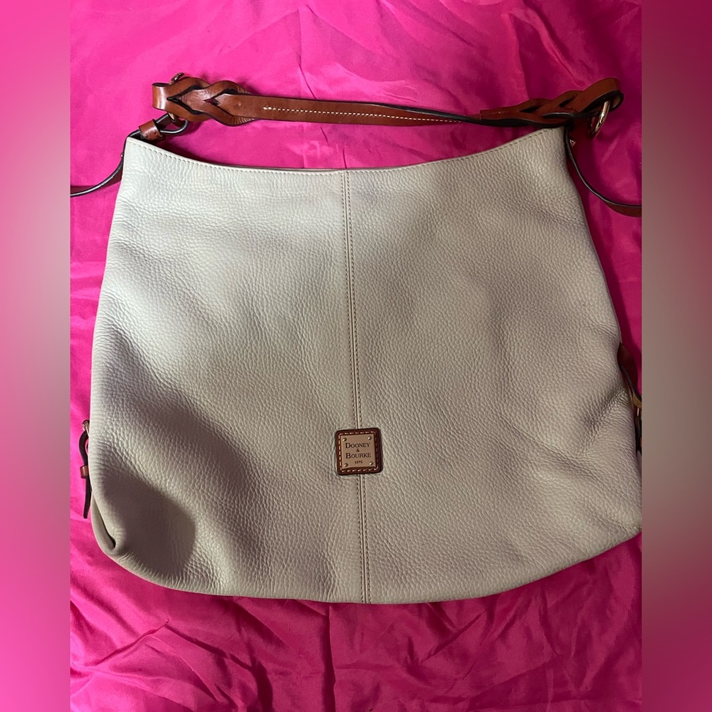 Dooney & Bourke Pebbled Beige Canvas Twist Strap Hobo